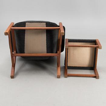 A 1960s 'Caravelle' armchair and ottoman for Puunveisto Oy - Träsnideri Ab, Finland.