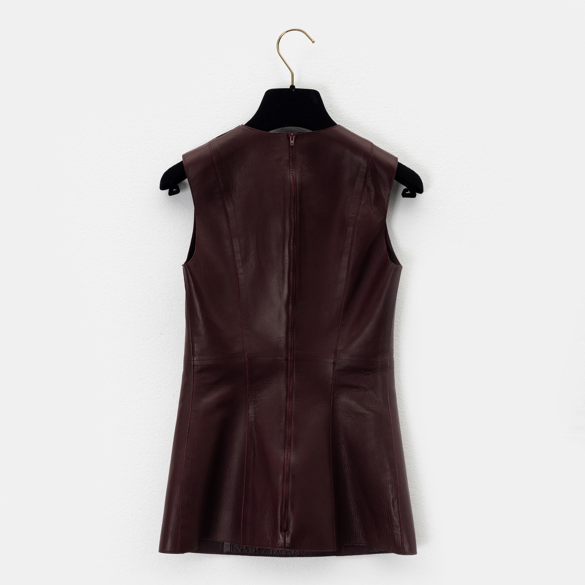 Céline, a leather top, size 36.