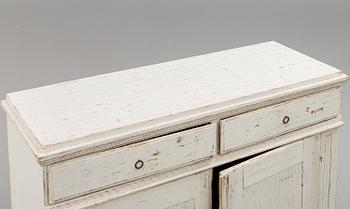 An early 19th Century Gustavian cupboard.