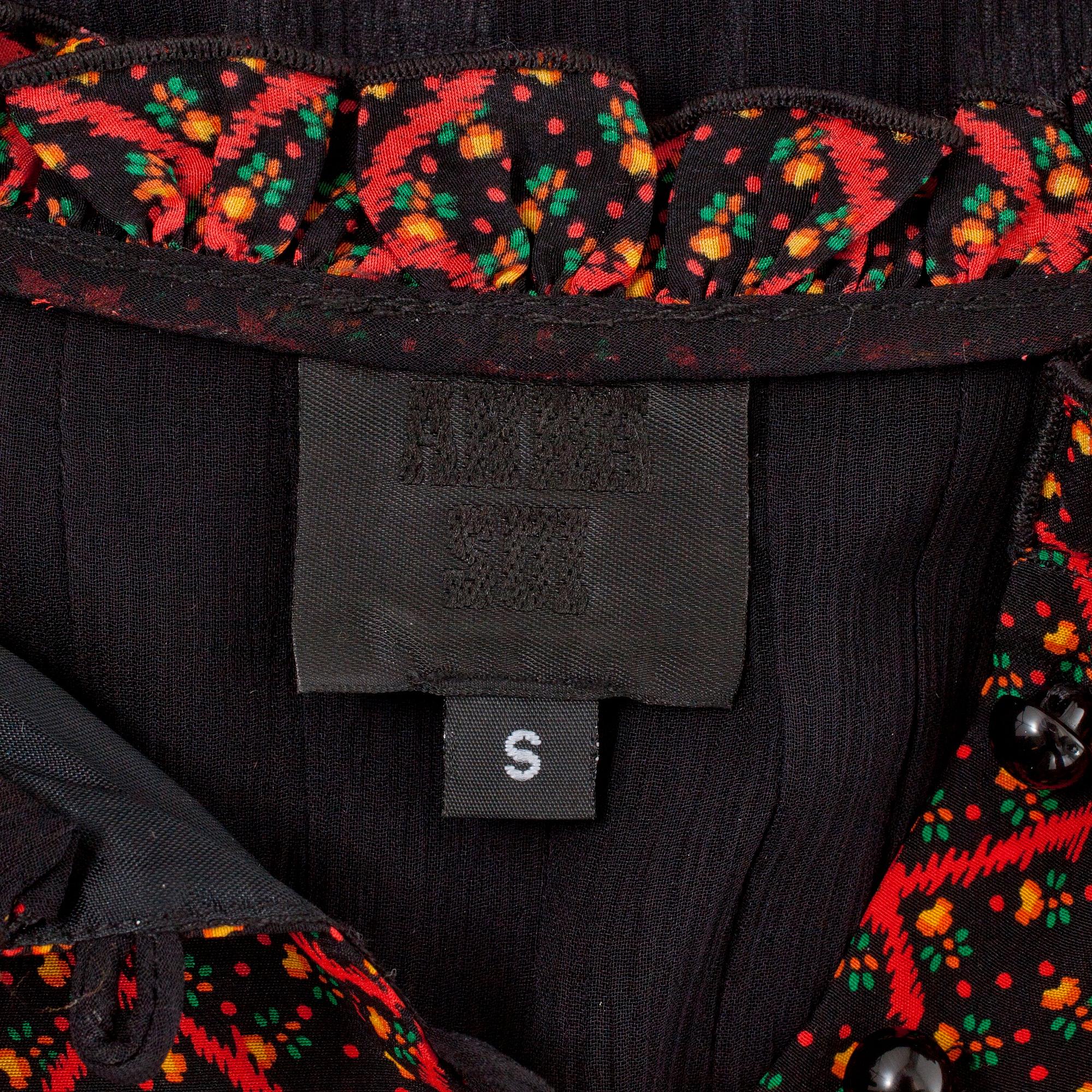 ANNA SUI, a black chiffon dress, size small.