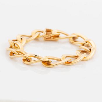 An 18K gold Jan Hellströmer bracelet.