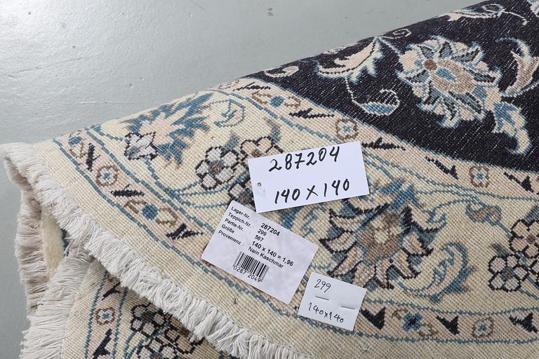 A rug, Nain, part silk, ca 140 x 140 cm.