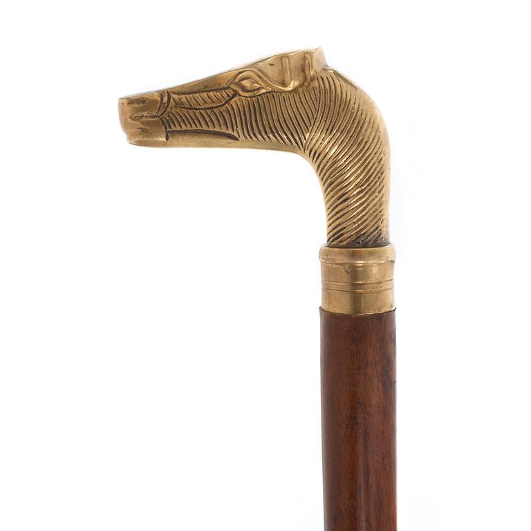 CAIN, mahogany and brass.