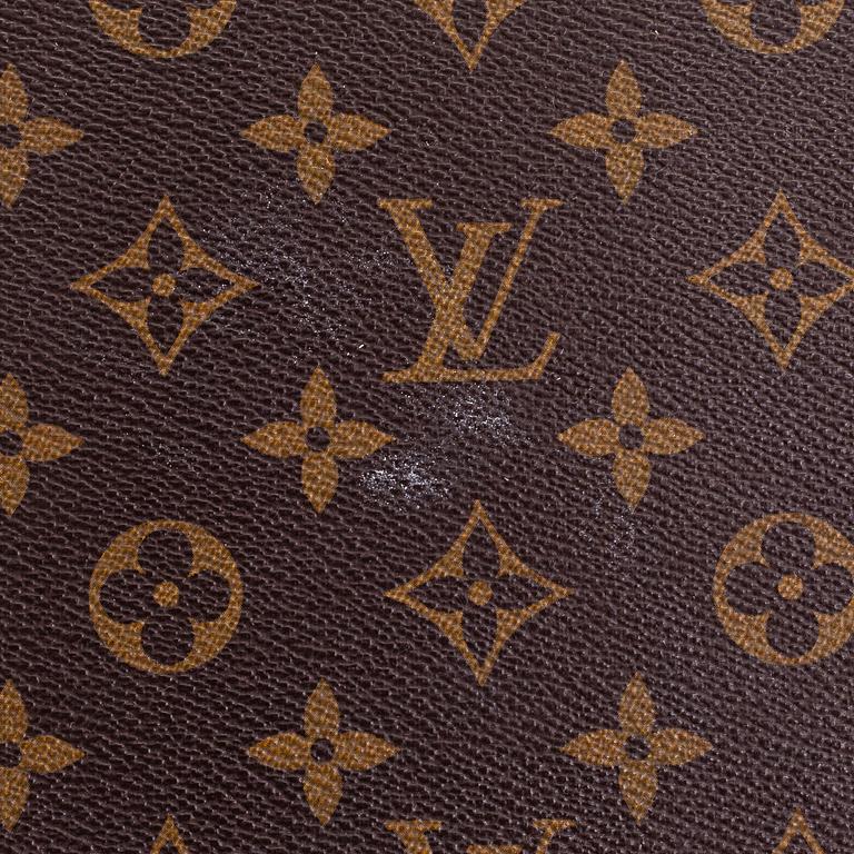 Louis Vuitton, four Monogram canvas accessories, 1987-2010.