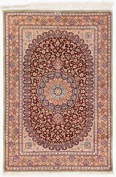 A oriental silk rug, c. 148 x 100 cm.