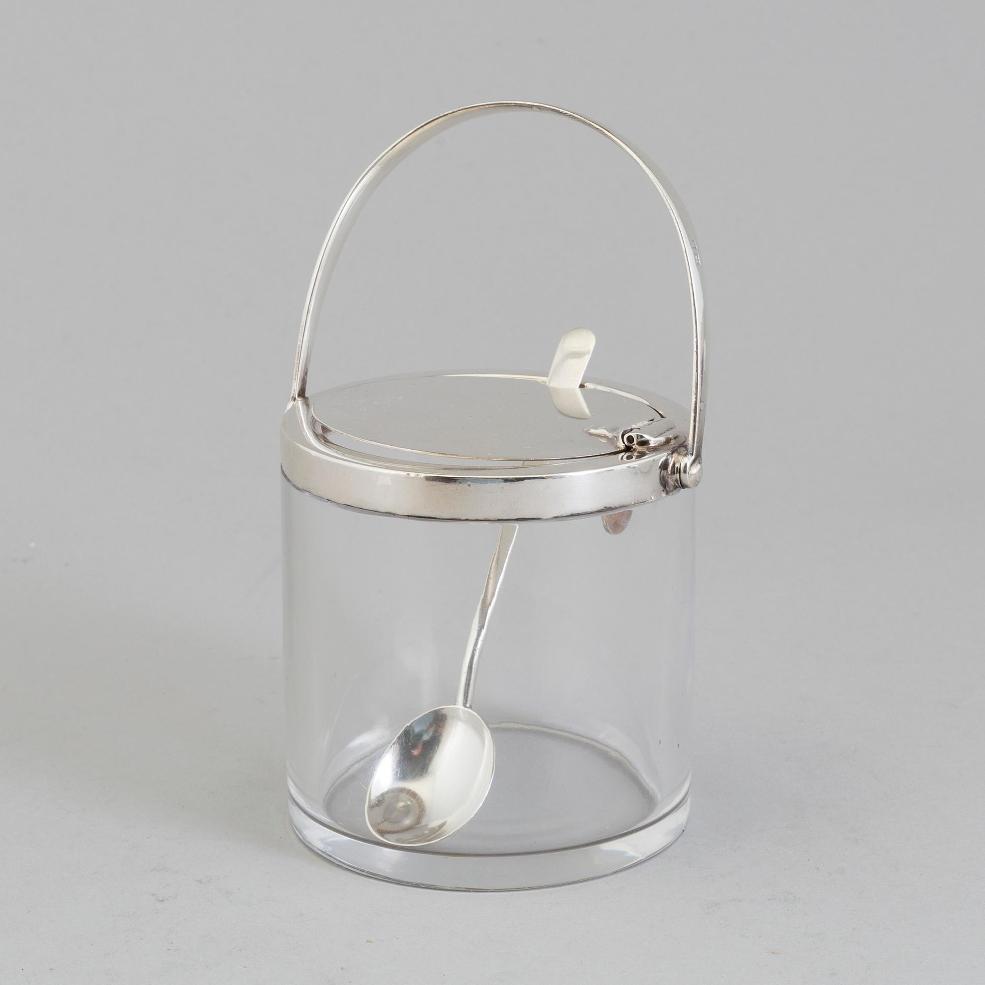 A glass and silver marmelade jar and spoon by Hukin & Heath Birmingham, England, 1934.