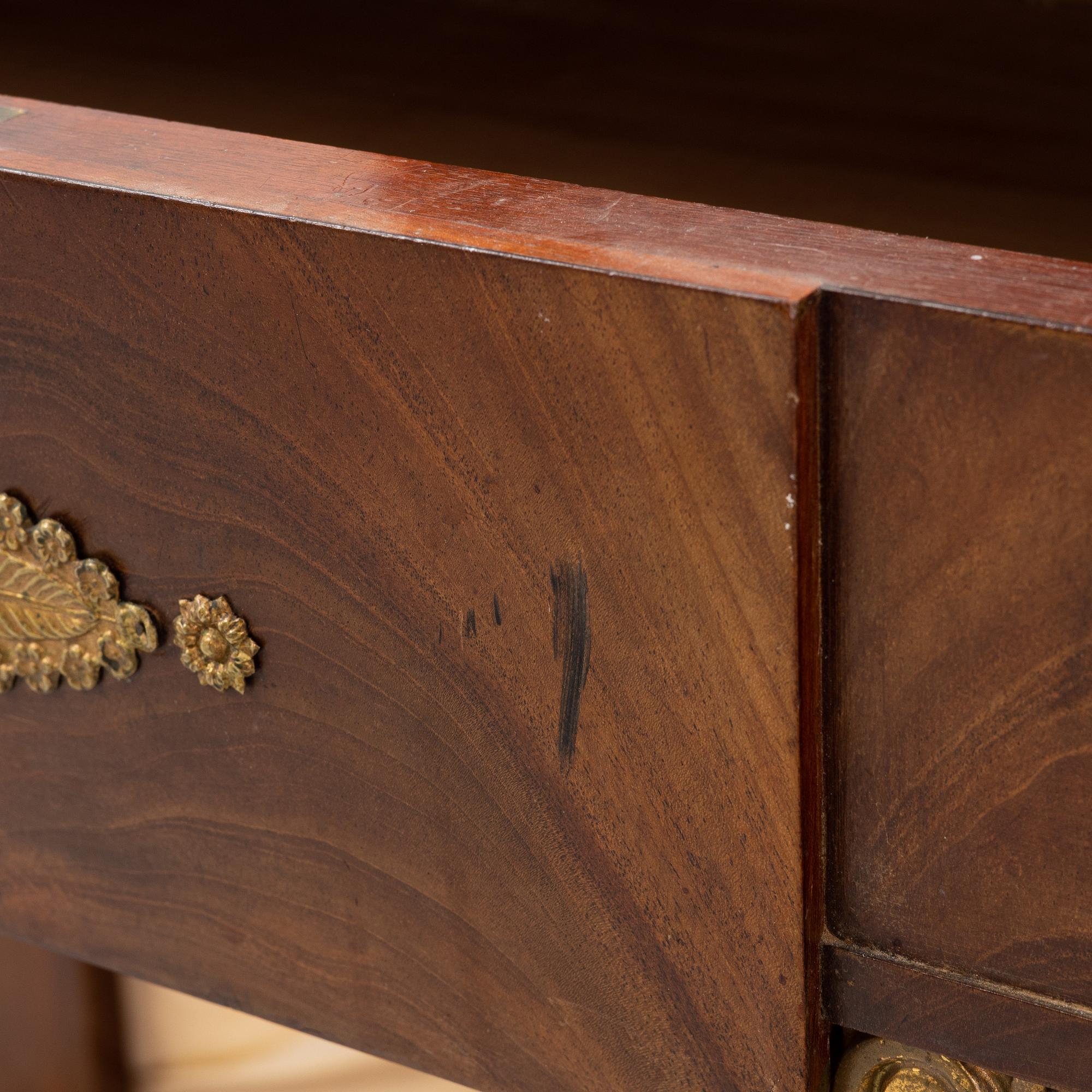 An Empire style dressing table by Johan Öman, Stockholm (1815-33), dated 1827.