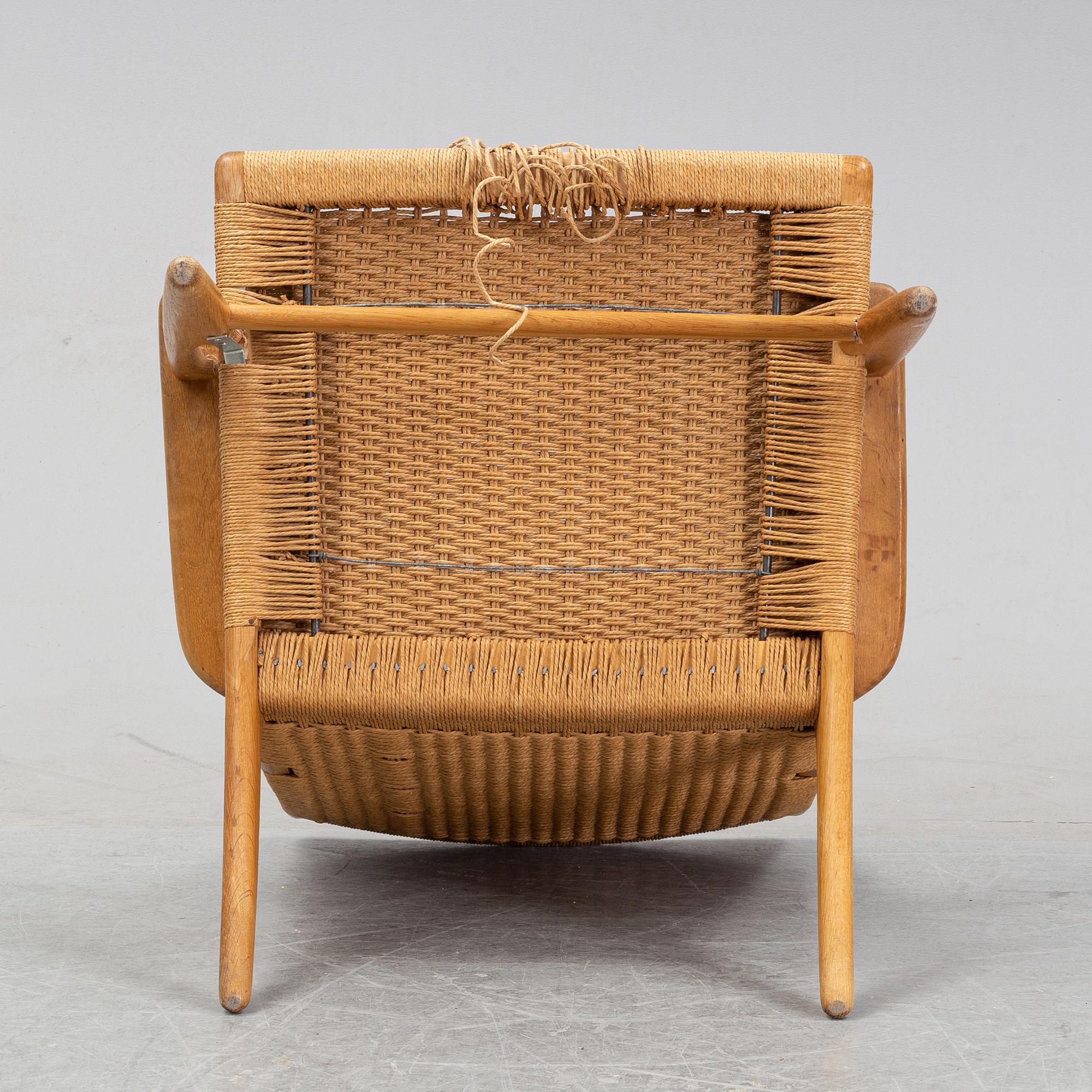 A 'CH-25' armchair designed by Hans J Wegner for Carl Hansen & Søn, Denmark.