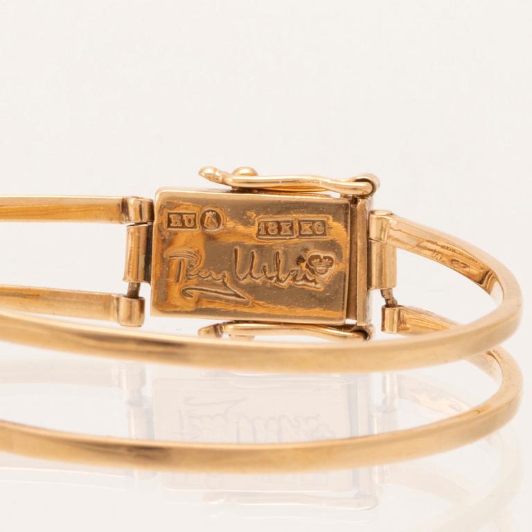 Rey Urban och Gübelin armbandsur 18K guld Stockholm 1960.