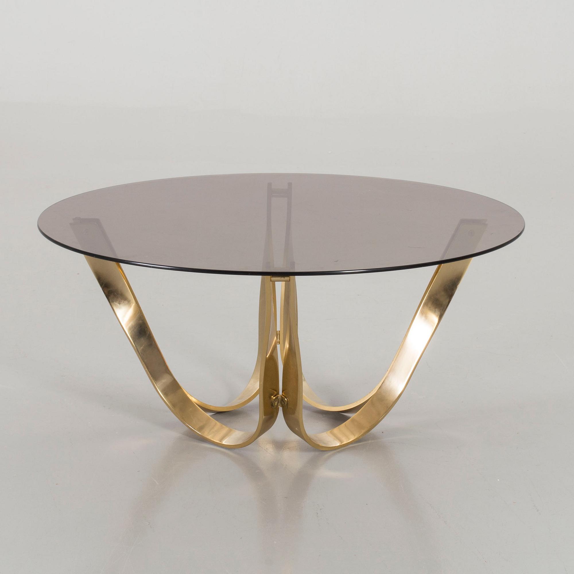 A GLASS TOP COFFEE TABLE BY ROGER SPRUNGER FOR DUNBAR USA.