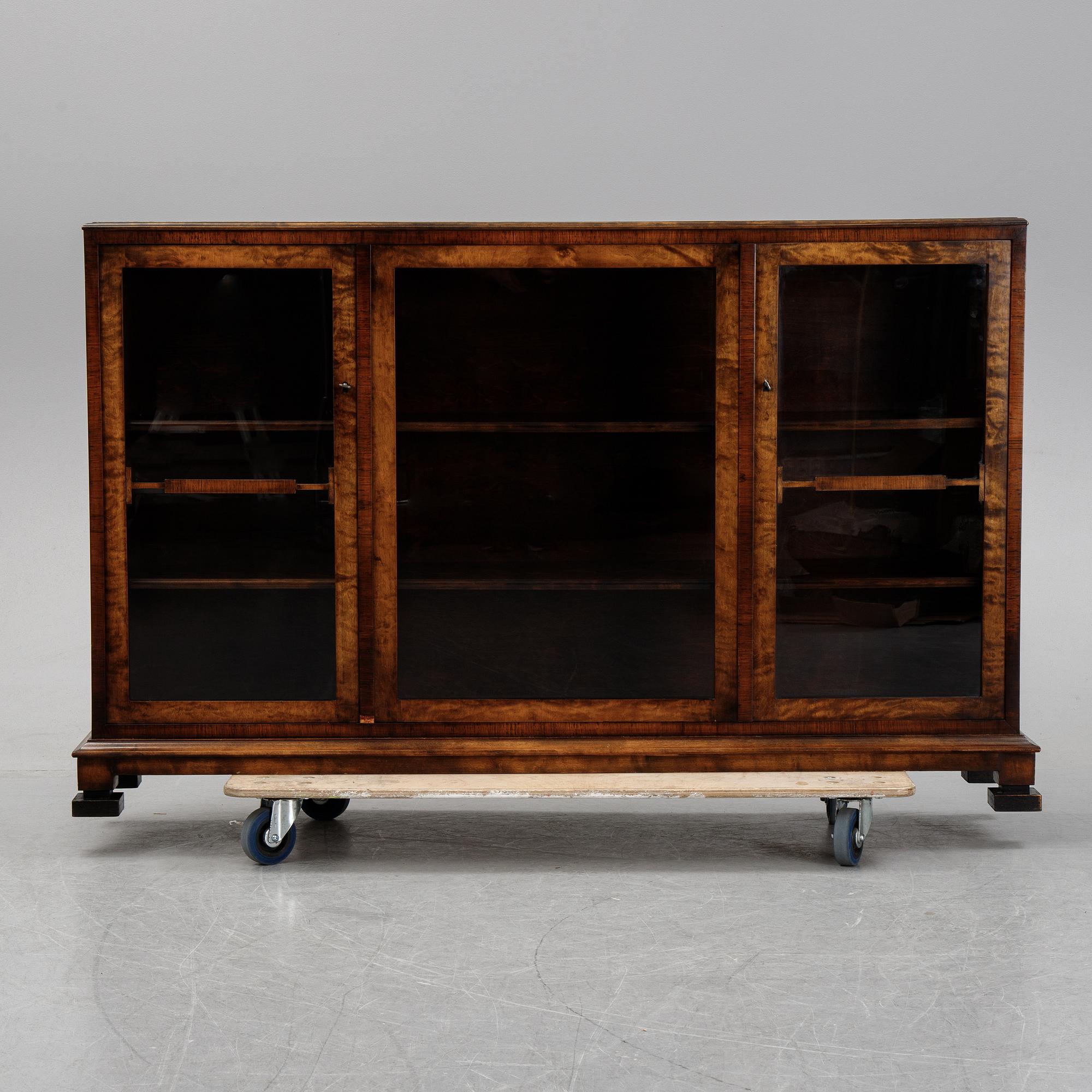 A birch display cabinet, Swedish Grace, first half of the 20th century.