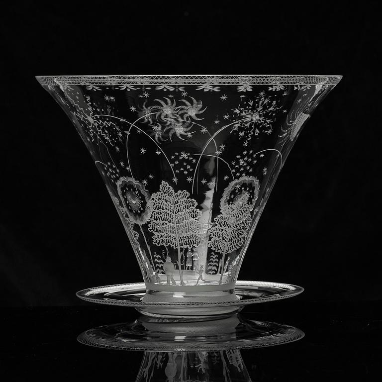 Edward Hald, a Swedish Grace "Fyrverkeri" (Fireworks) engraved glass bowl with a plate, Orrefors, Sweden, 1925, model 248.