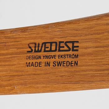Yngve Ekström, a 'Lamino' armchair with ottoman and sidetable, Swedese, Sweden, 21st century.