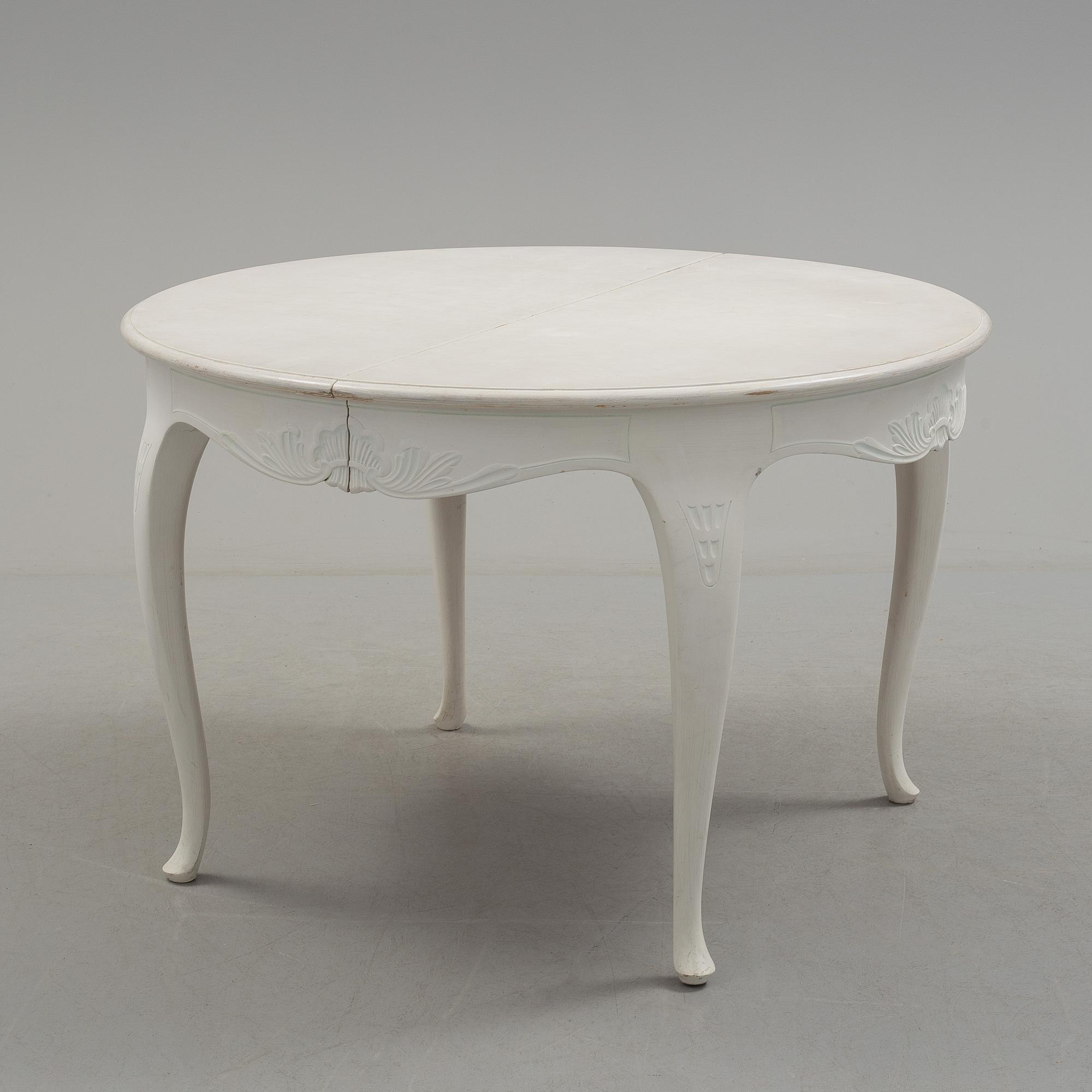 a rococo-style dining table from the 20th century.