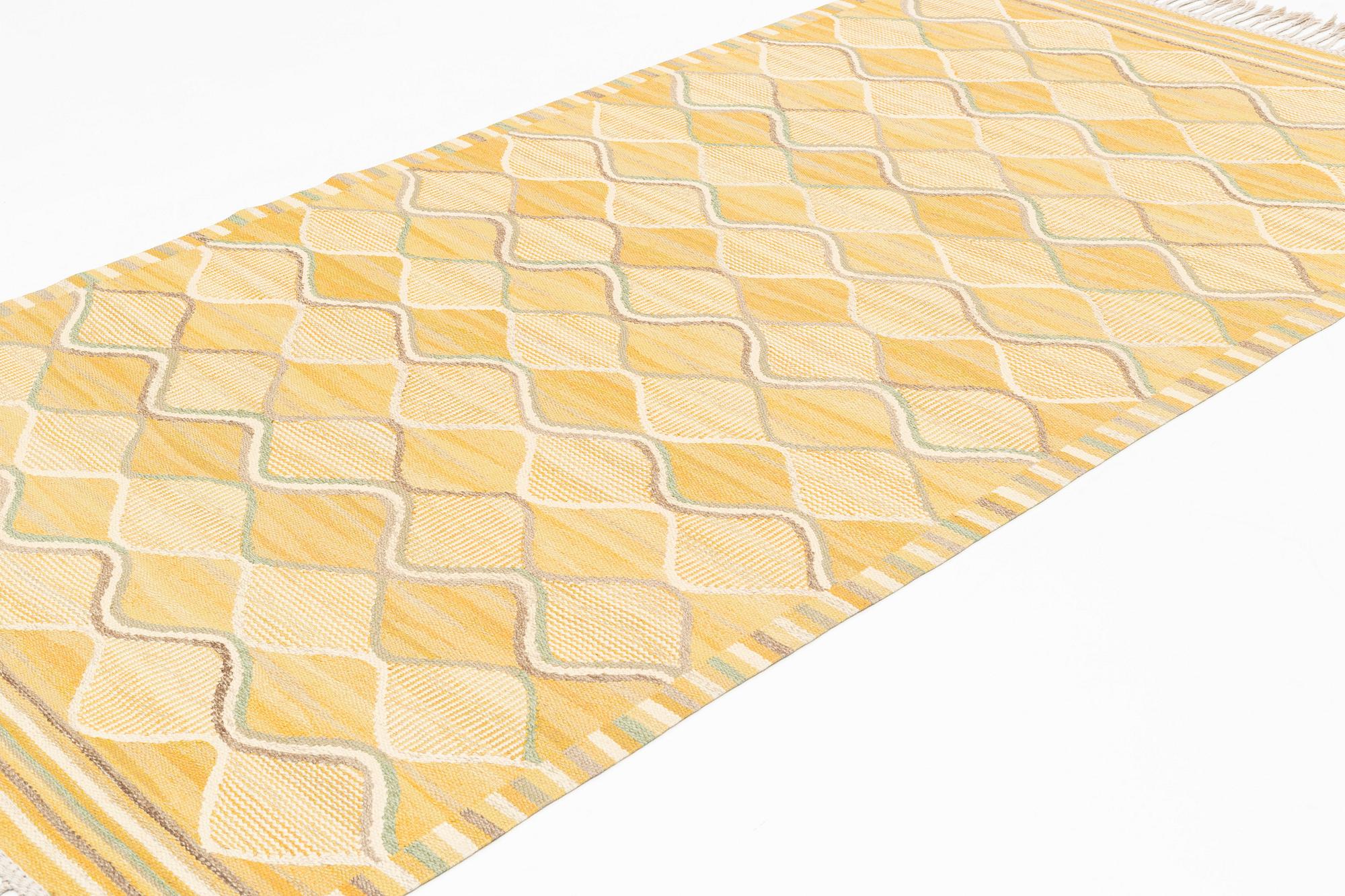 Barbro Nilsson, a carpet, "Spättan, gul", flat weave, ca 269 x 146 cm, signed AB MMF BN.