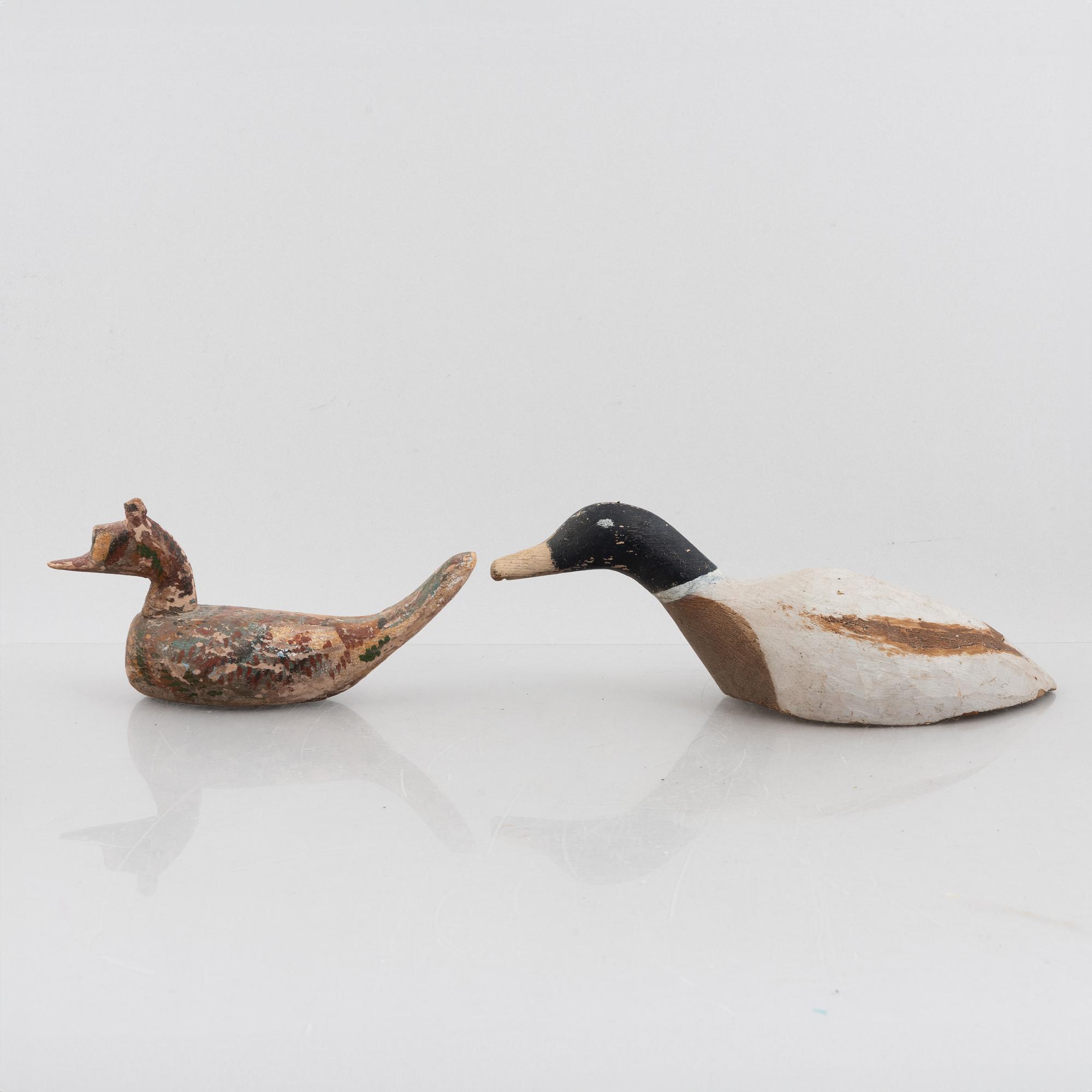 A set of six wooden duck decoys, 20th century.