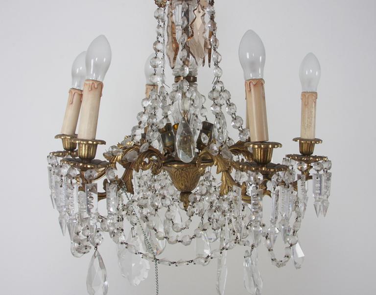 LJUSKRONA, nyrokokostil. H 74.
Proveniens: Git Gay.