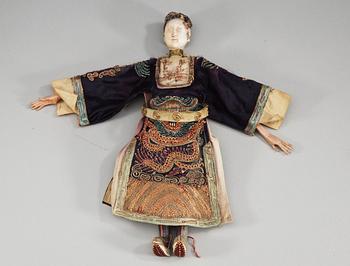 A pair of chinese bisque dolls with silk clothing, Qing dynasty.