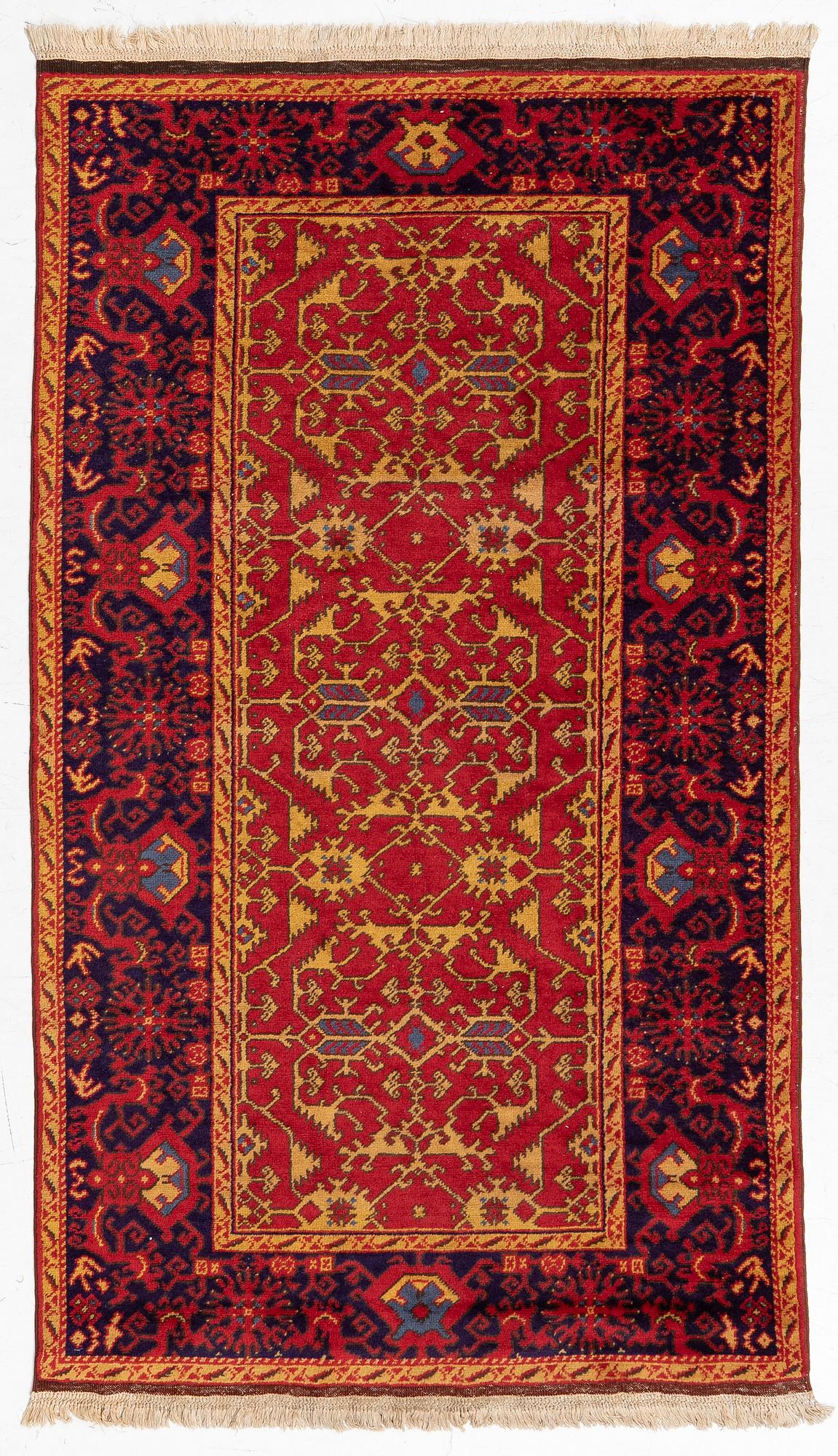A semi antique Romanian "Lotto" rug, c. 214 x 123 cm.