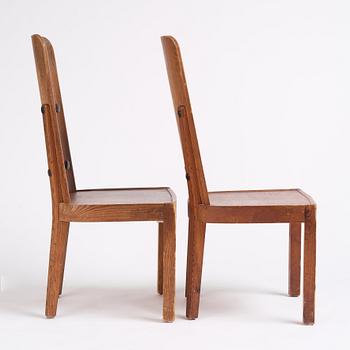 Axel Einar Hjorth, a pair of stained pine 'Lovö' chairs, Nordiska Kompaniet, Sweden 1930s.