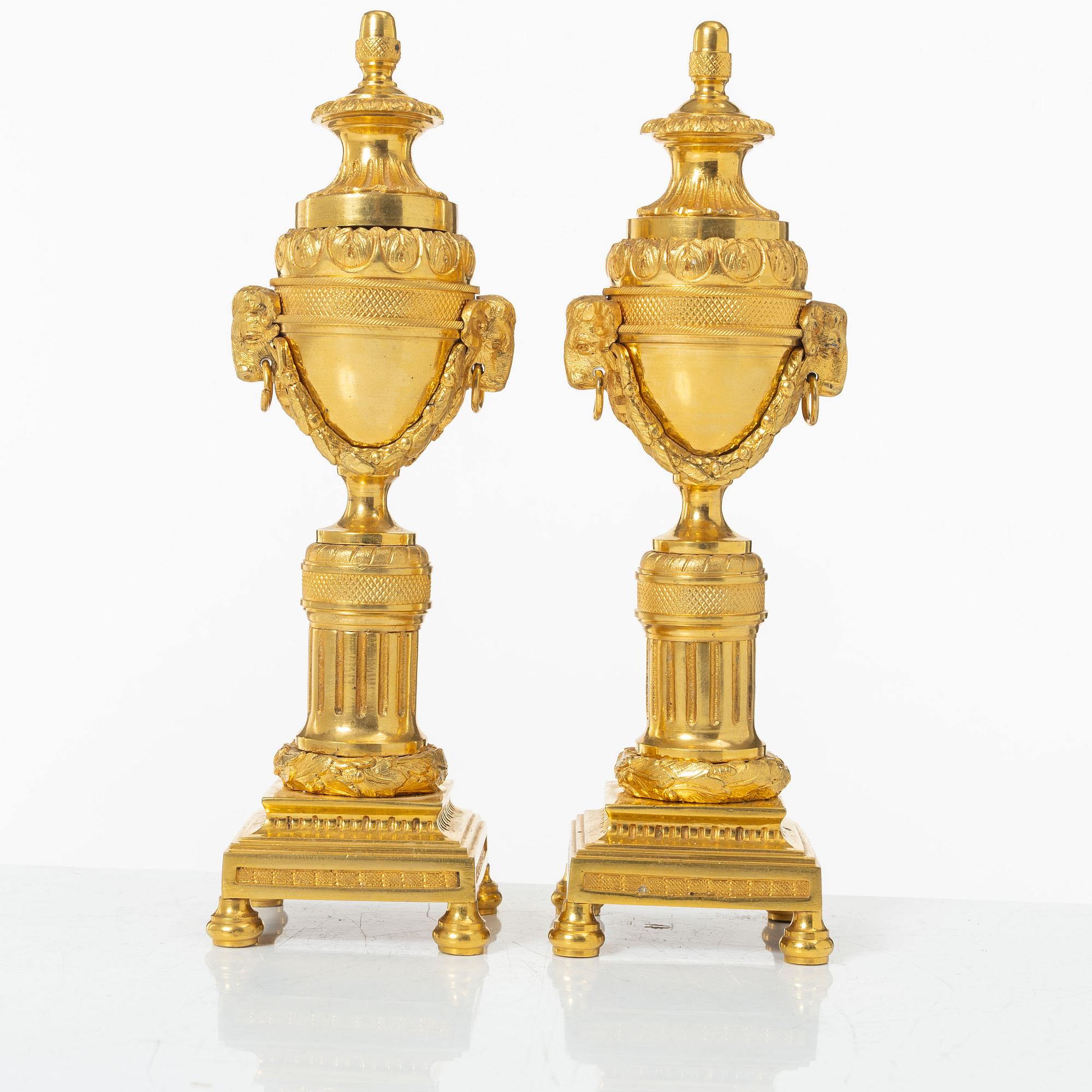 A pair of French Louis XVI style gilt-bronze casolettes, later part 18th century.
