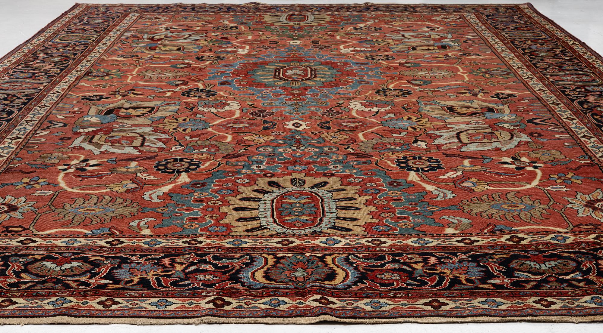 A Sultanabad carpet, west Persia c. 530 x 378 cm.