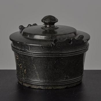 A serpentine stone butter box and cover circa 1800.