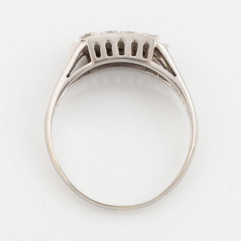 18K gold ring with diamonds.