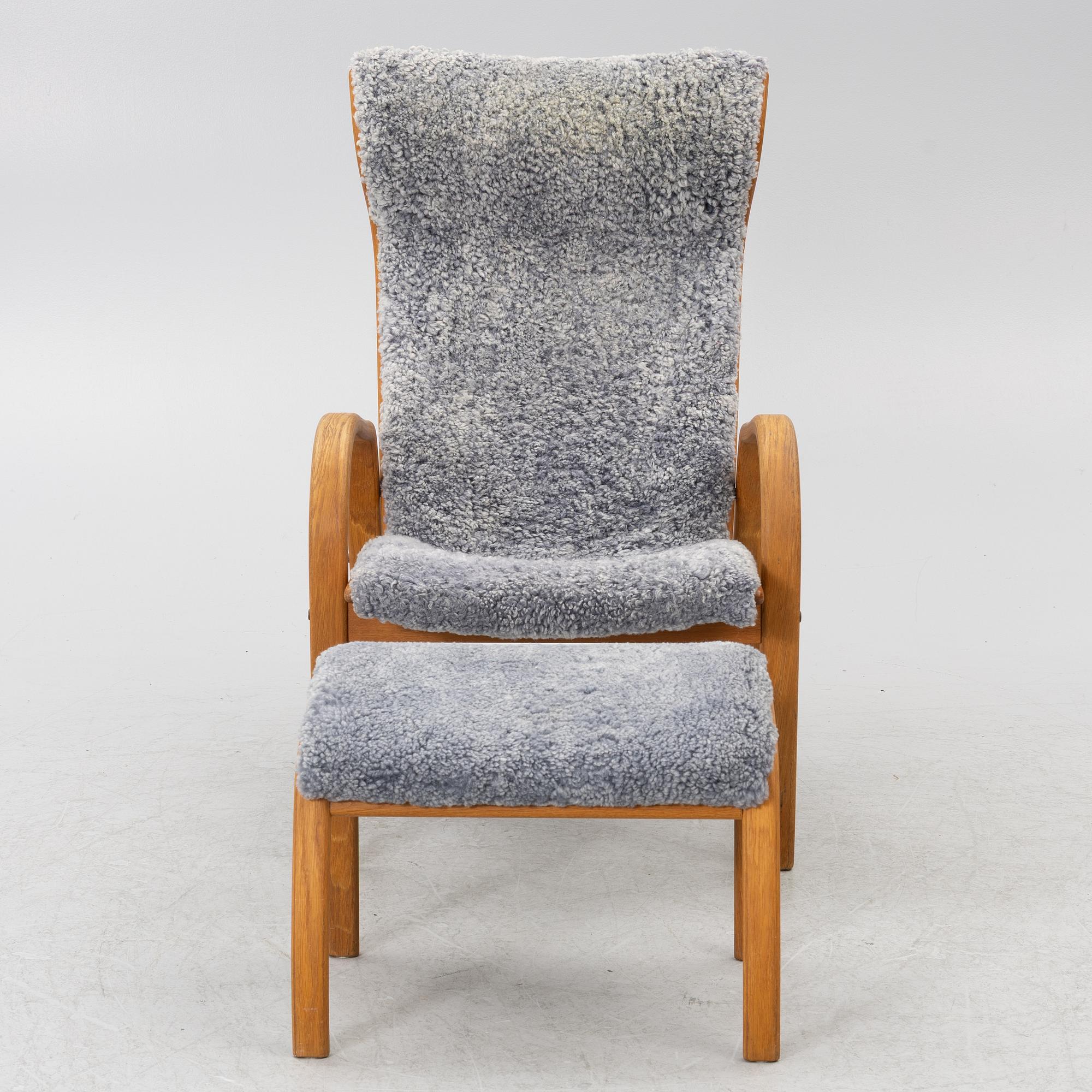Jan Ekström, armchair with footstool "Gazelle", Conform, 21st century.