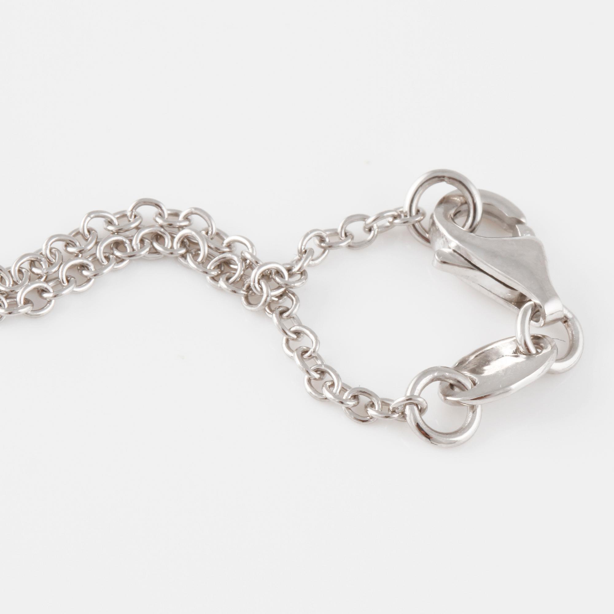 DIAMANTGRADERING, COLLIER, 18K vitguld med 6 briljantslipade diamanter ca 0.30 ct. Vikt 3,4 gram.