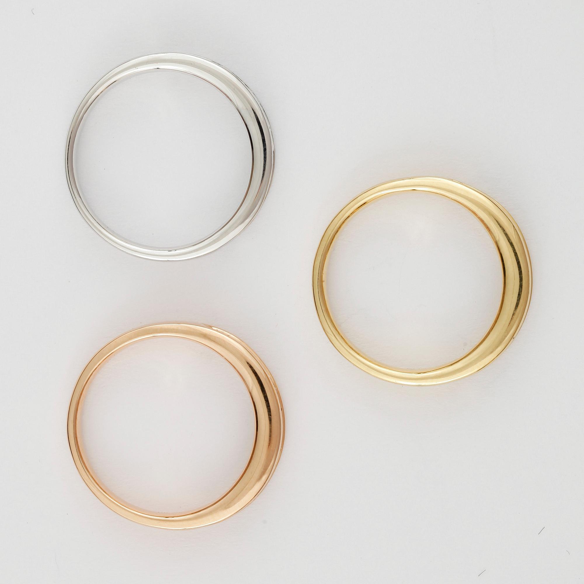 RINGAR, 3 st, alliansringar, 18k guld med ca 30 prinsessslipade diamanter tot ca 2,71 ct. Vikt ca 11 gram. 2000-tal.