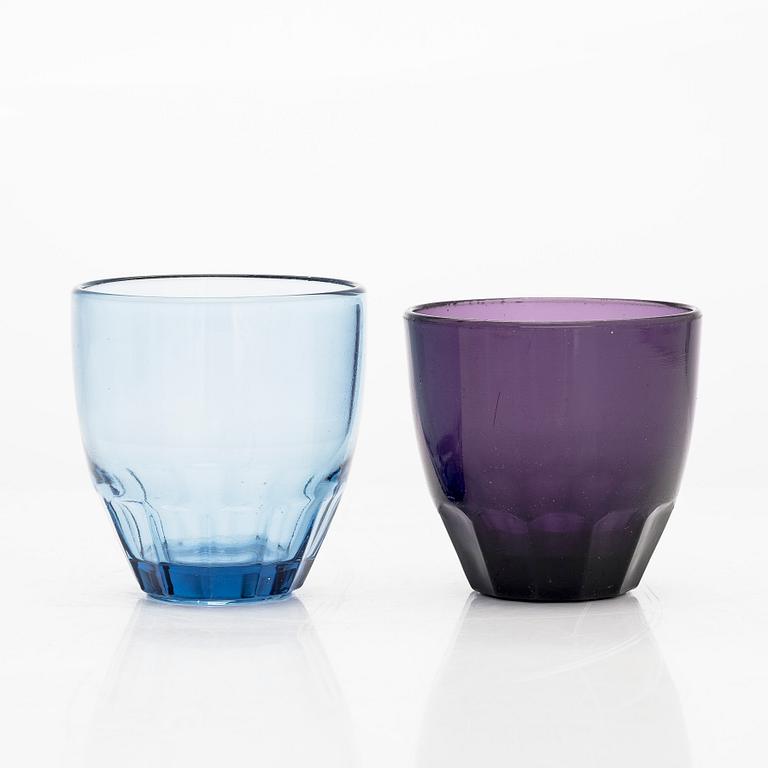 Drinking glasses, A set of ten pressed glass with cut base, mid-20th century.