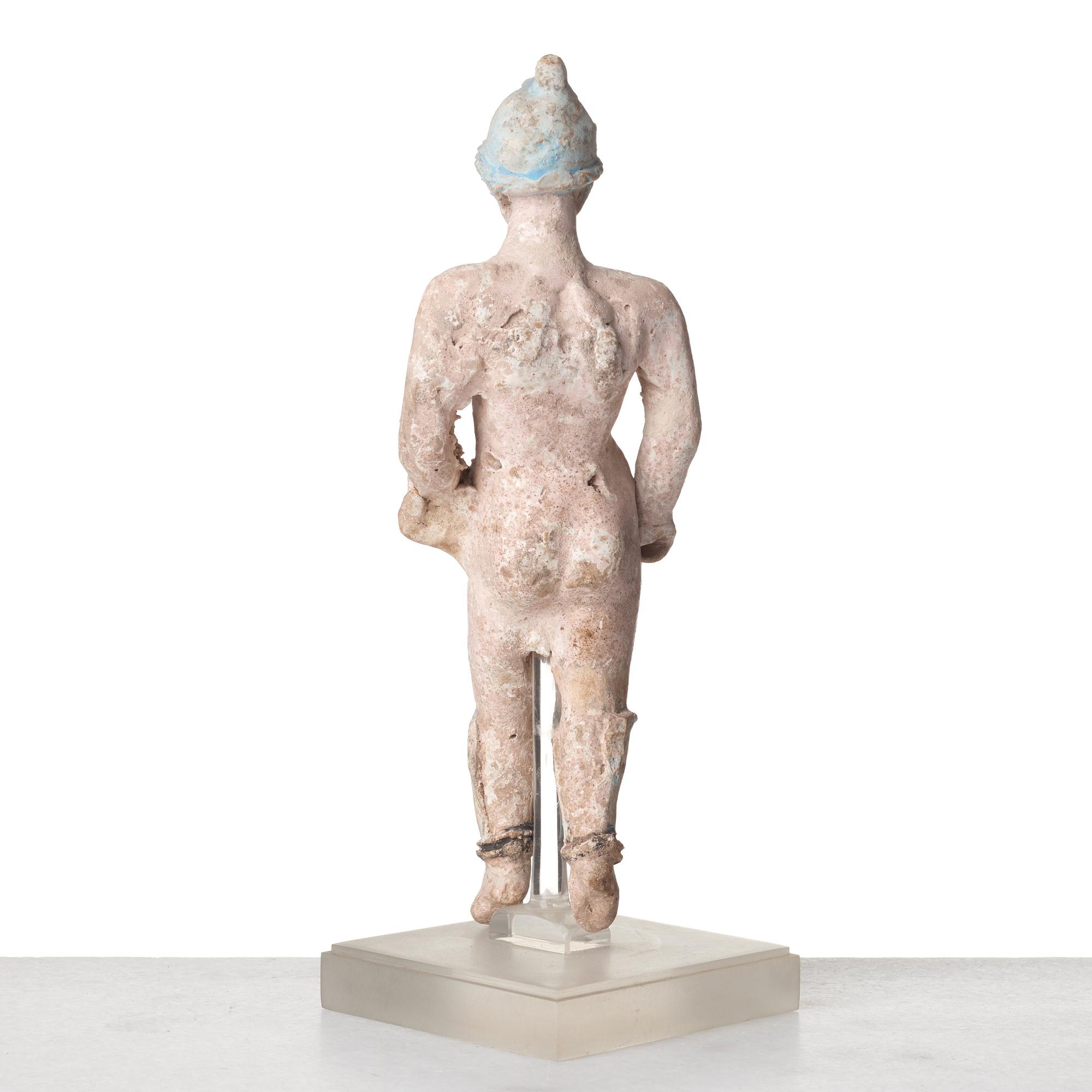 A Greek terracotta sculpture of a warrior, Hellenistic period, Canosa, 3rd Century B.C.