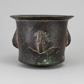A 15th century bronze mortar.