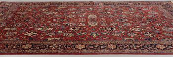 A carpet, semi-antique Sarouk, ca 389 x 271 cm.