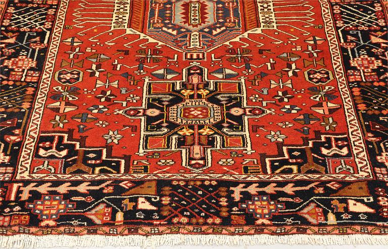 A Heris rug, approx. 191 x 157 cm.