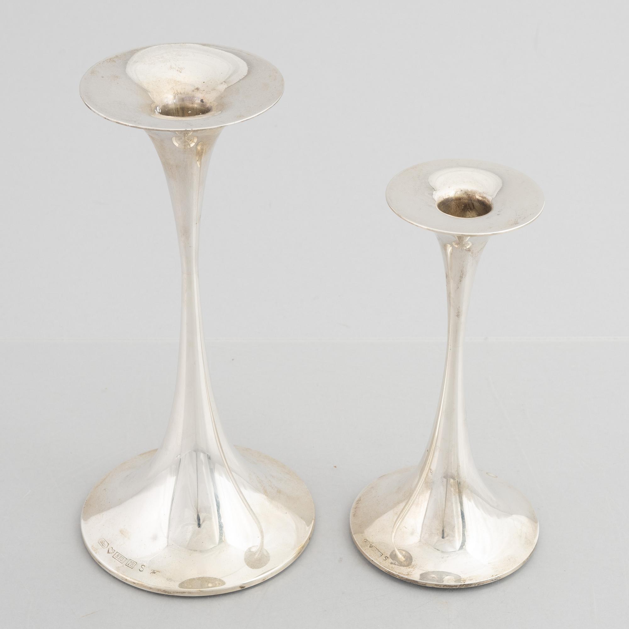 Two silver candlesticks, marks of Tapio Wirkkala, "Trumpetti", Kultakeskus, Tavastehus, Finland 2001.