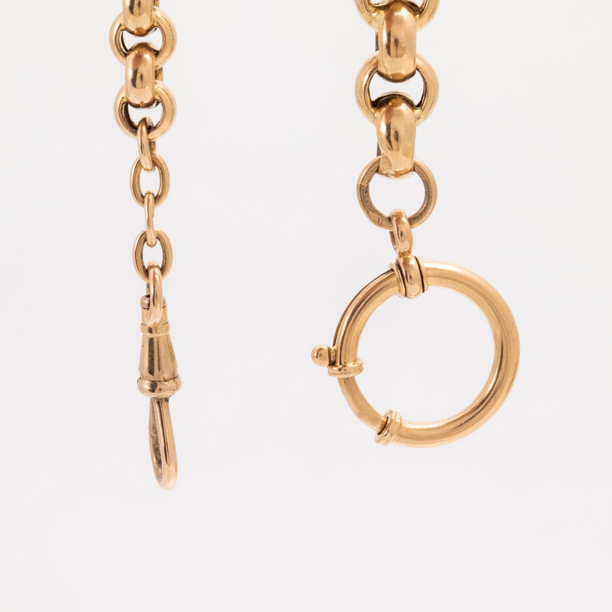 An 18K pocket watch chain.