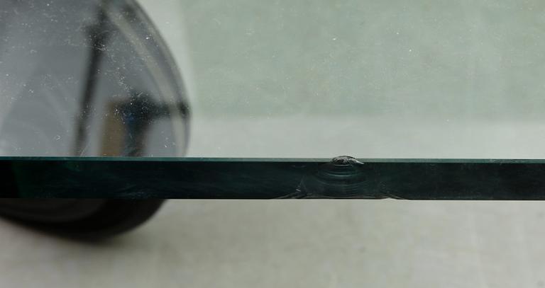 A Gae Aulenti 'Tavola con Ruote' table, Fontana Arte, Italy.