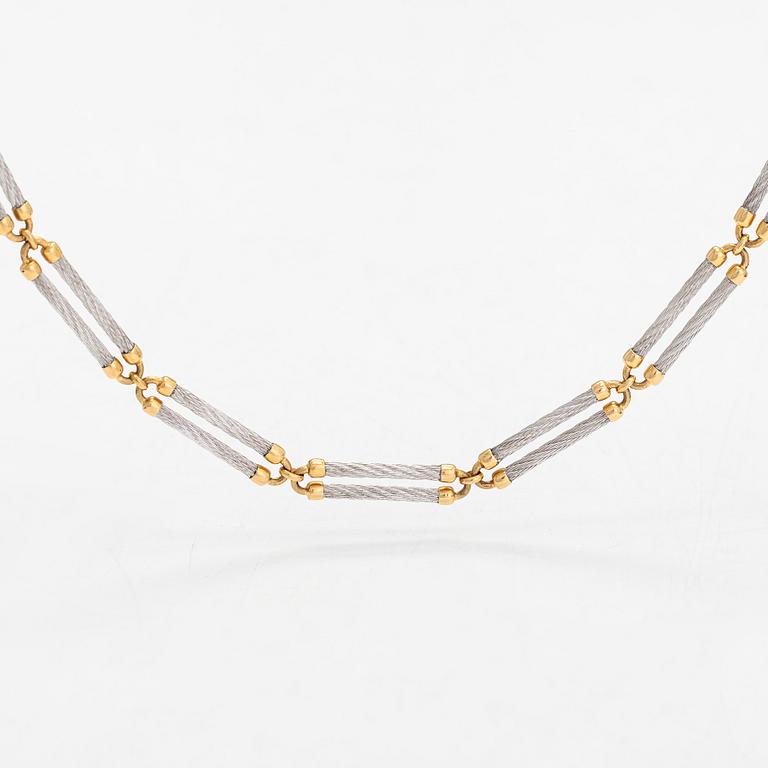 A 'Force 10' necklace, 18K gold and steel. Fred, Paris 1980's.
