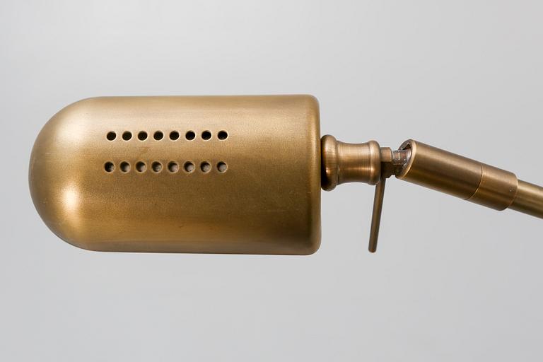 A pair of brass floor lamps 21 st century.