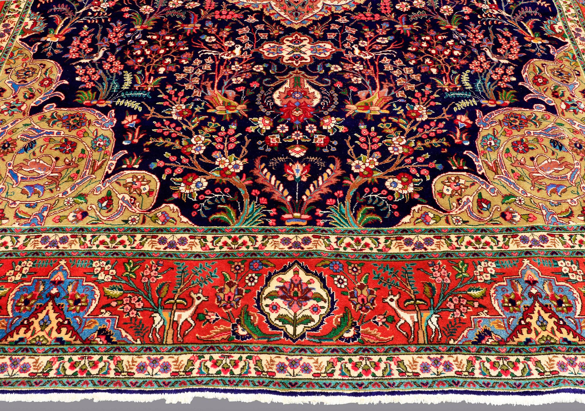 A CARPET, Figural Tabriz, ca 407 x 304 cm.