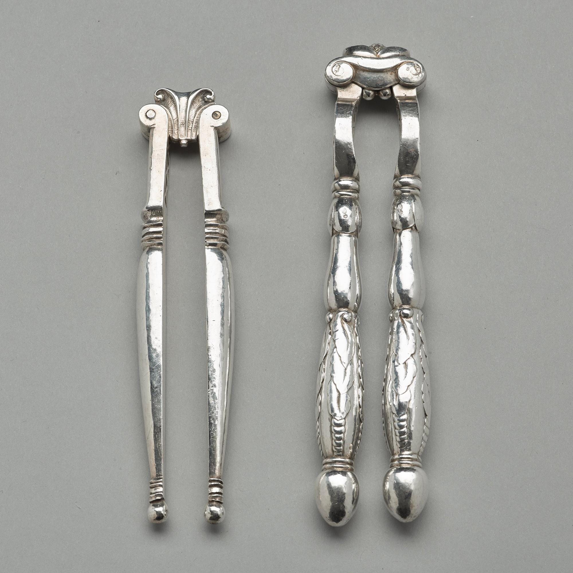 Georg Jensen, OCH JOHAN ROHDE, nötknäppare, 2 st, Firma Georg Jensen, Köpenhamn 1919-27, 830/1000.