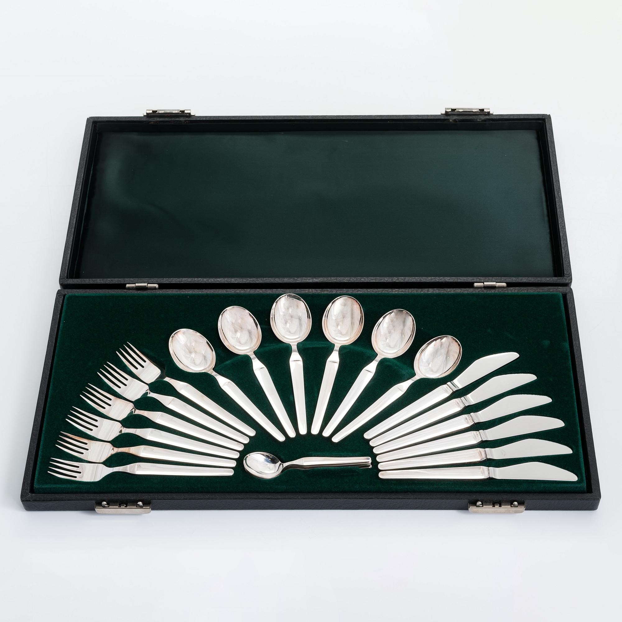 A 72-piece sterling silver cutlery set, 'Diplomat', Kultateollisuus Turku 1978. In three original boxes.