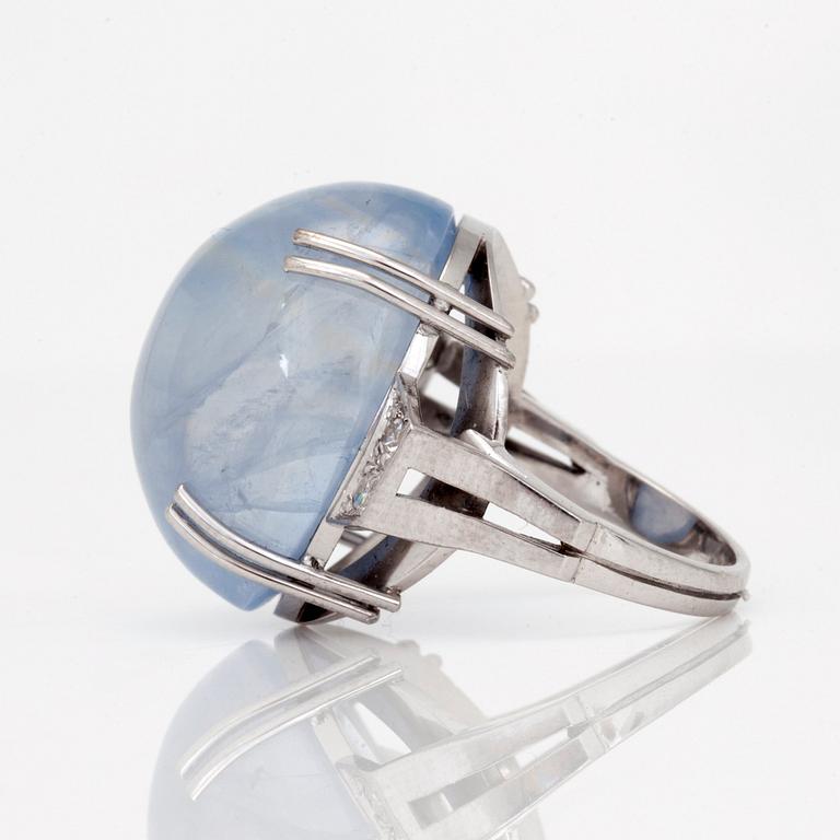 A circa 55.00 ct unheated cabochon-cut sapphire and diamond ring.