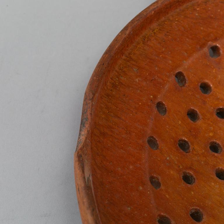 Two pottery strainers, 19th Century, Sweden.