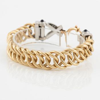 Armband 18K guld med runda briljantslipade diamanter samt safirer.