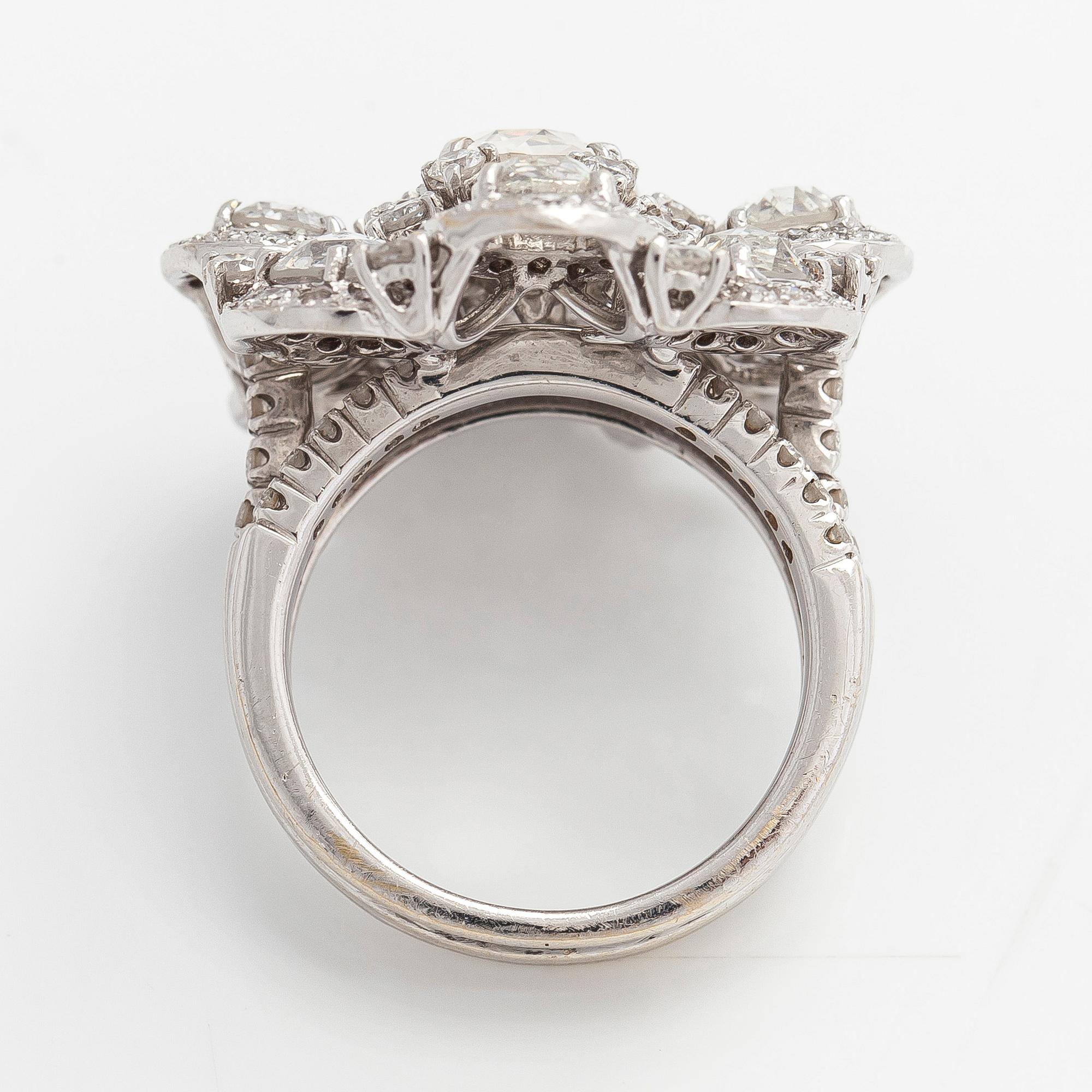 Sormus, 18K valkokultaa, ruusuhiottuja ja briljanttihiottuja timantteja.