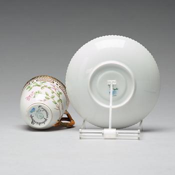 A set of four Royal Copenhagen 'Flora Danica' coffee cups with saucers, Denmark, 20th Century.