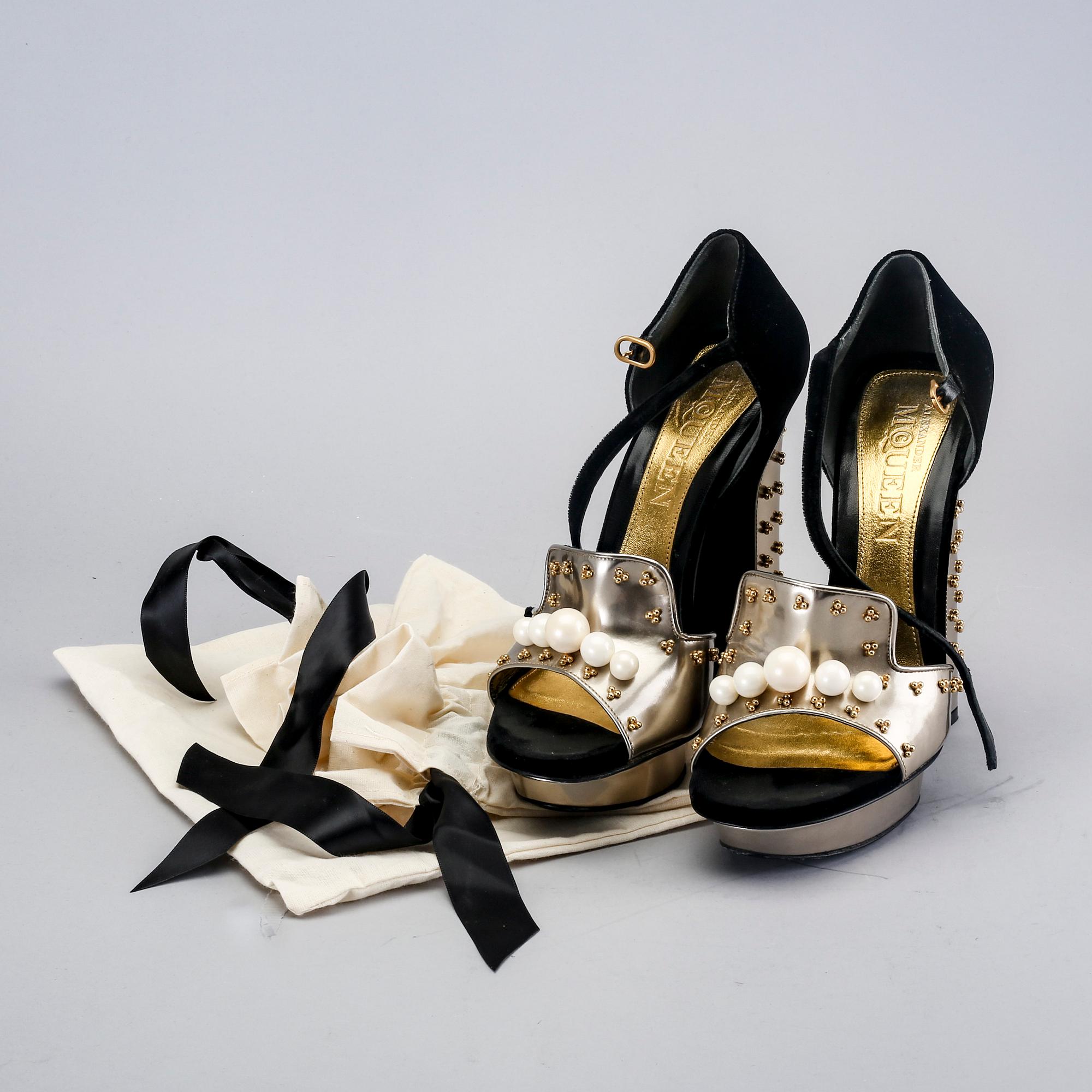 Alexander McQueen, a pair of shoes.